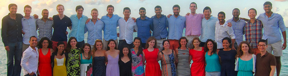 Students and their significant others pose in the Bahamas during their last trip together.