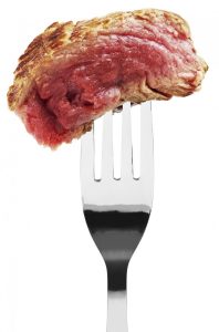 red meat on a fork