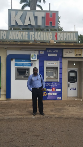 Dr. Odonkor at the entrance of the Komfo Anokye Teaching Hospital (KATH)