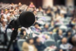 a closeup image of a microphone on a stage