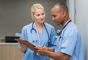 Two doctors discuss a laboratory test.