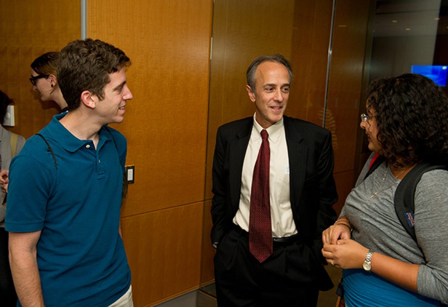 Roy Ziegelstein, vice dean for education, socializes with students at the first of a series of new seminars.