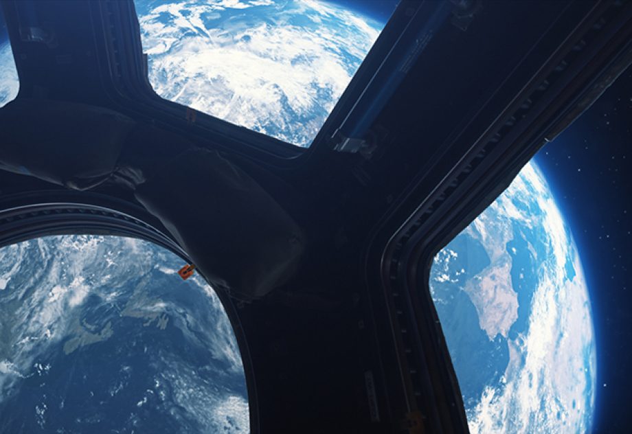 A view of Earth from space, as seen from a window of the International Space Station.