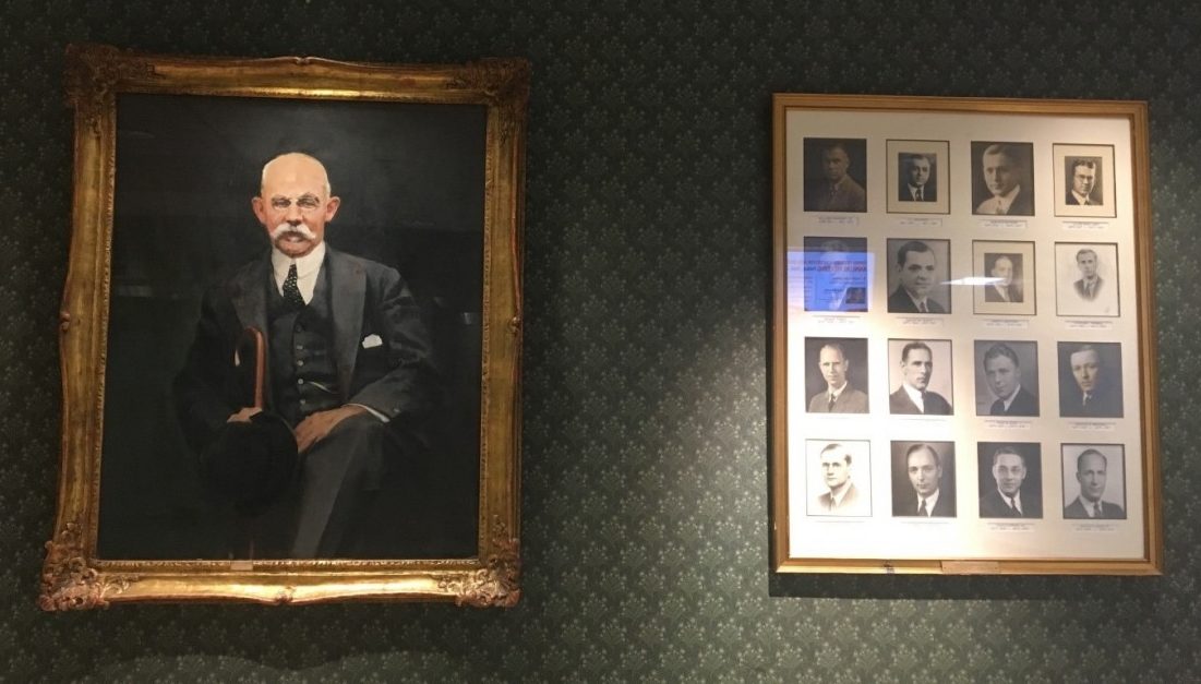 Portraits of men displayed around Johns Hopkins.