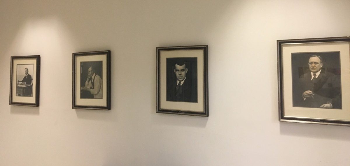 Portraits of men displayed around Johns Hopkins.
