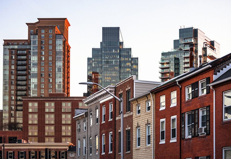 A skyline of Baltimore rowhomes and office buildings.