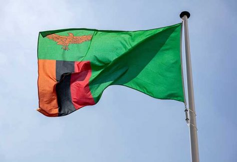 Zambia flag waving in the wind.