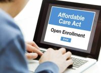 A person in the process of signing up and joining the Affordable Care Act Obamacare in the United States in the open enrollment for his healthcare insurance plan.