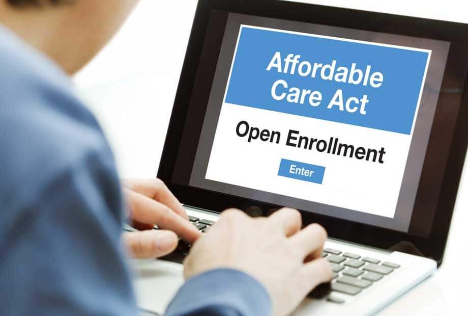 A person in the process of signing up and joining the Affordable Care Act Obamacare in the United States in the open enrollment for his healthcare insurance plan.