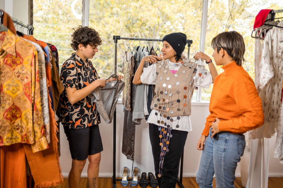 Three young people shopping having fun