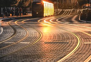 City street scene with tramway at sunset in Bordeaux, France