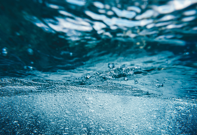 Underwater splash with bubbles.
