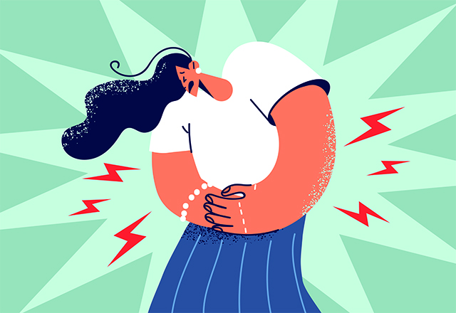 a woman clutching her stomach