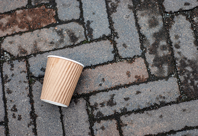 Paper coffee cup waste on floor