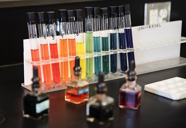 STEM topic, science tubes representing LGBTQ+ rainbow.