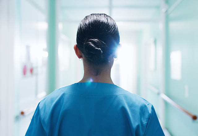 doctor walking in clinic for healthcare